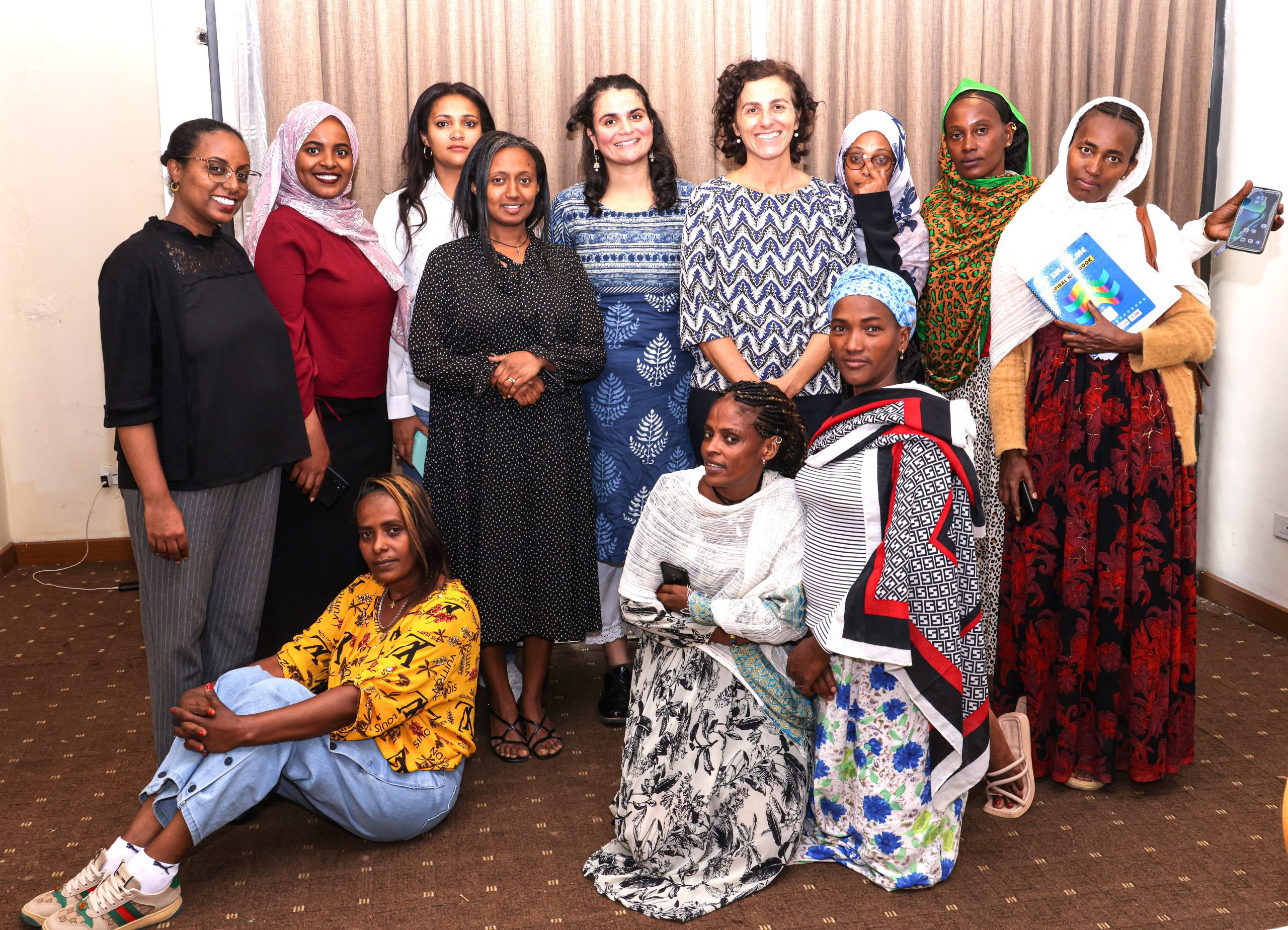 group photo of survivors after the workshop